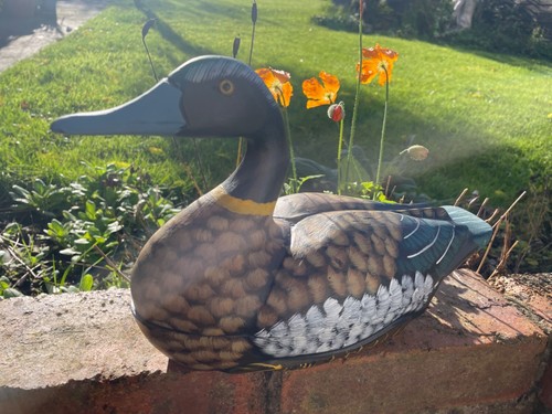 Hand carved and painted - hand,
